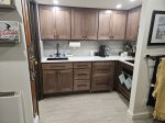 Kitchen with dishwasher and under the counter fridge